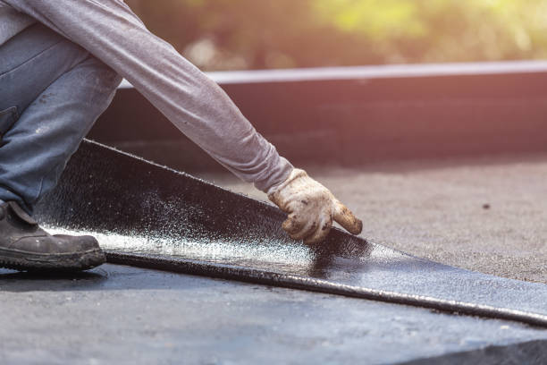 Professional Waterproofing technician working in Westphalia, MI